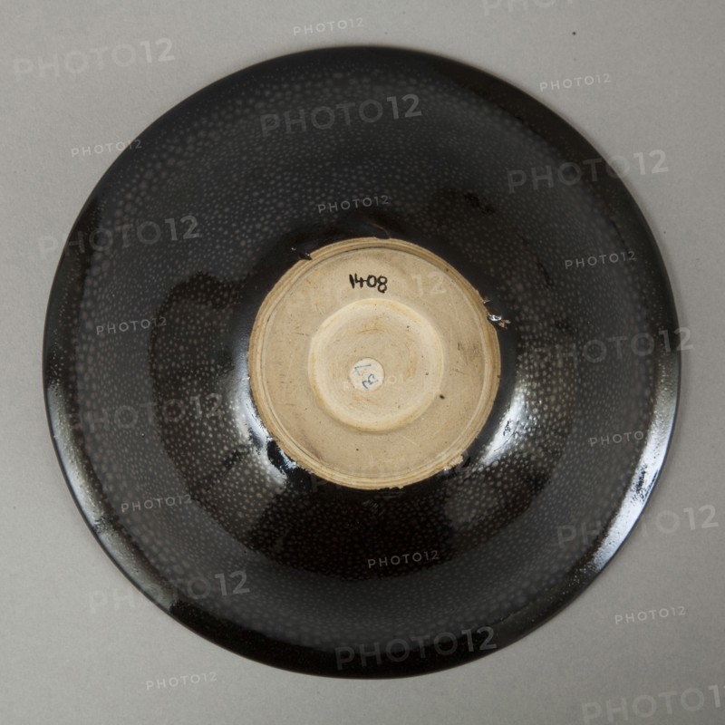 A 20th century copy of buff-bodied Cizhou-type bowl with oil spot glaze, 20th century. Artist: Unknown.