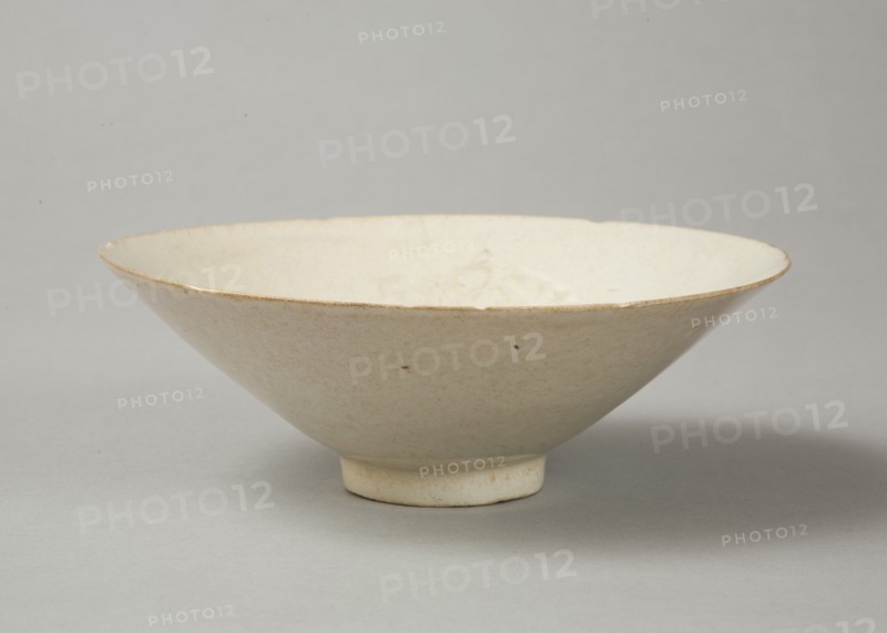 Lobed bowl with qingbai glaze with carved floral design made in the Northern Song dynasty. Artist: Unknown.