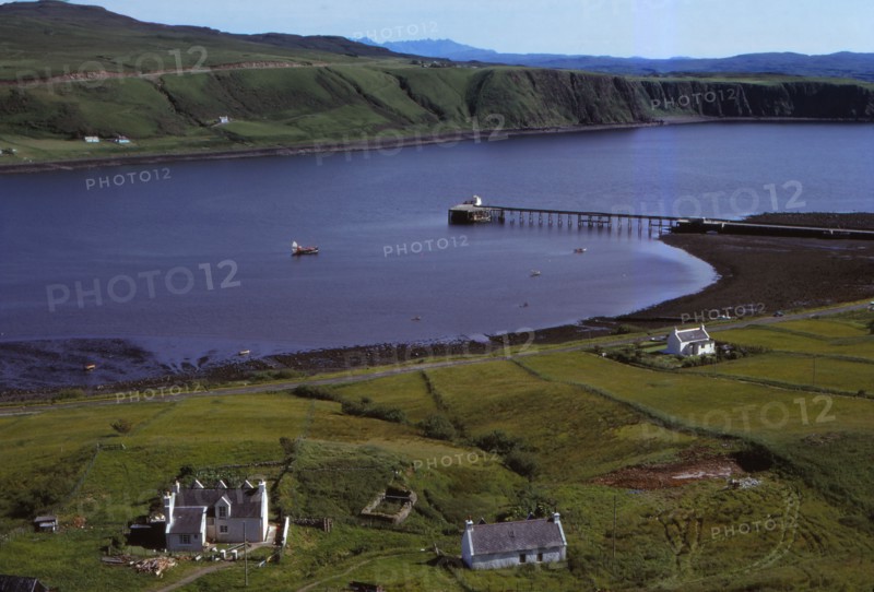 Village of Uig, and Jetty for ferry to outer Hebrides, Isle of Skye, Scotland, 20th century. Artist: CM Dixon.