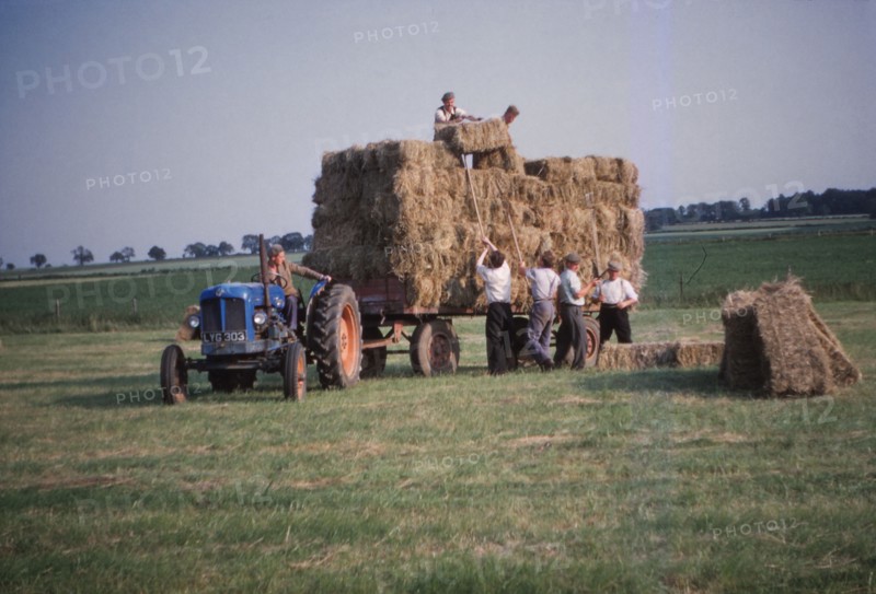 Loading bales of hay, England, c1960. Artist: CM Dixon.