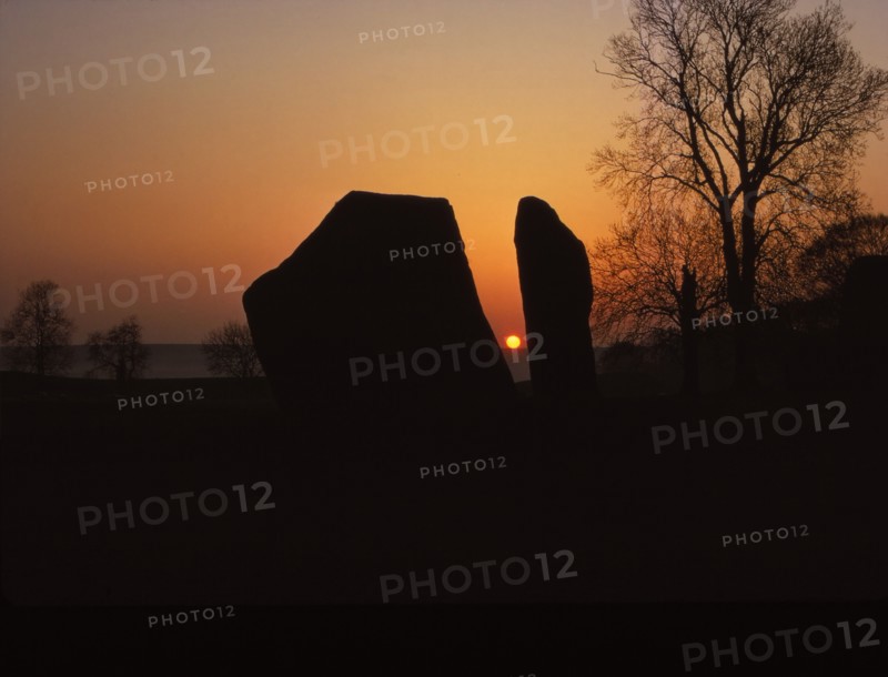 Sunrise on Megalithic Circle, Avebury, Wiltshire, 20th century. Artist: CM Dixon.