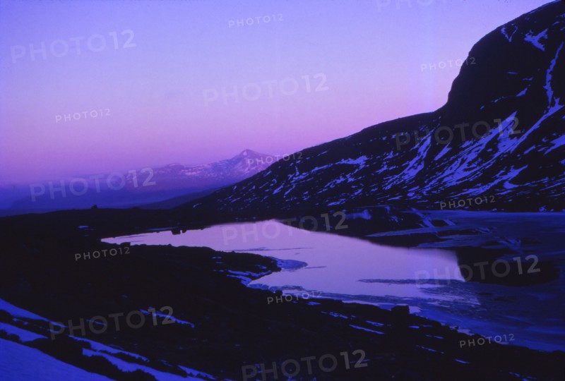 Scotland, Ross-Shire. Sunset at Loch Toll  An Lochain below An Teallach, April. Artist: CM Dixon.
