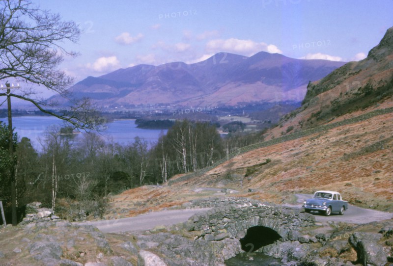Watendlath Bridge with Derwentwater and Skiddaw Beyond, Lake District, Cumberland, c1960. Artist: CM Dixon.