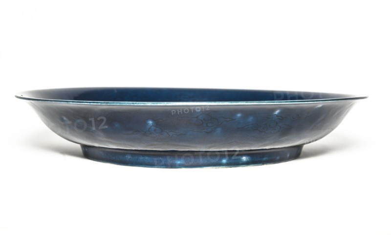 Deep blue dish with carved dragon design, 1522-1566. Artist: Unknown.