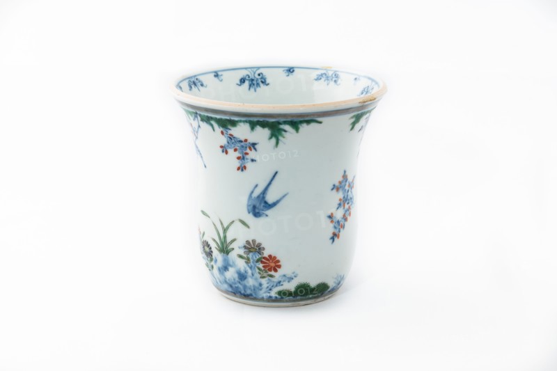 Beaker with underglaze blue birds, grasses and flowers, 1660-1677. Artist: Unknown.