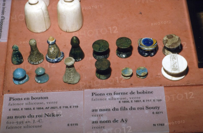 Faience, Glass and Ivory Playing Pieces from Egyptian Tombs, circa 1500 BC. Artist: Unknown.