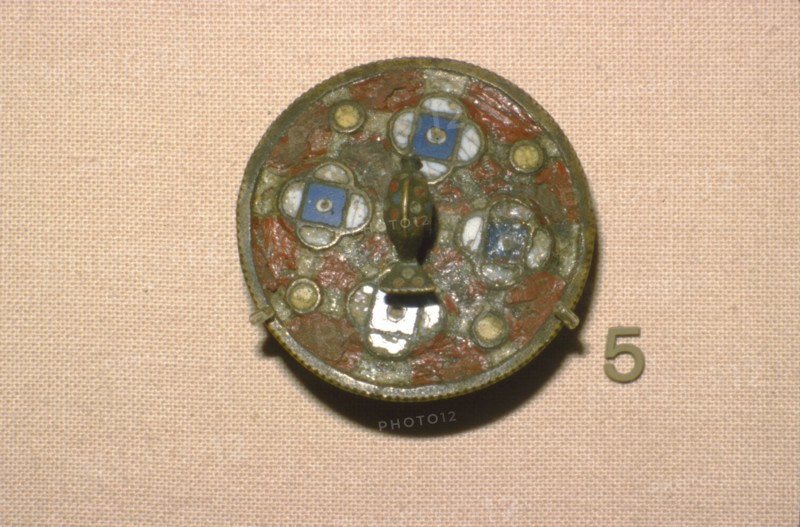 Enamelled bronze Brooch with stylised Dolphin in centre, 2nd-3rd century.  Artist: Unknown.