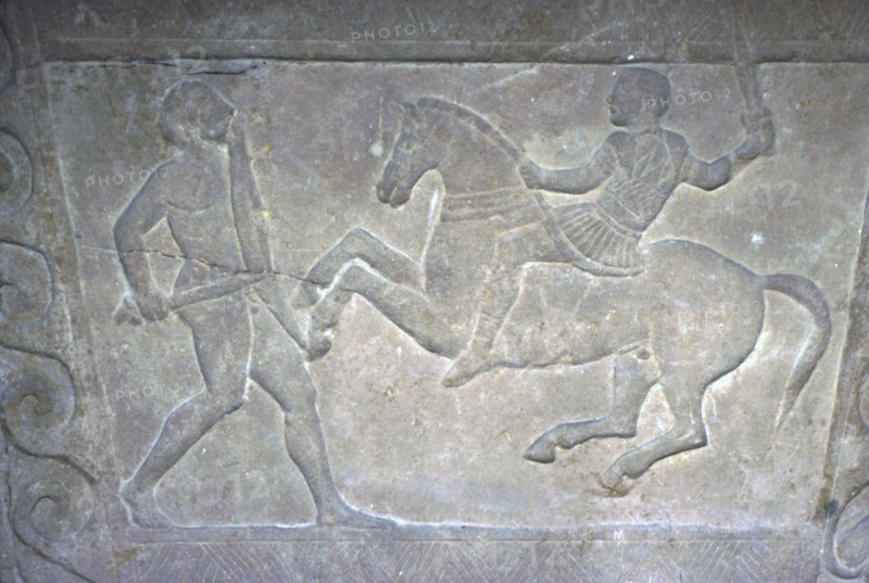 Etruscan Stela Detail, Combat between horseman and foot-soldier, c4th century BC. Artist: Unknown.