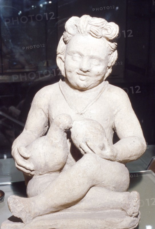 Terracotta Etruscan Votive of Child Feeding Bird, from Vulci, c2nd century BC. Artist: Unknown.