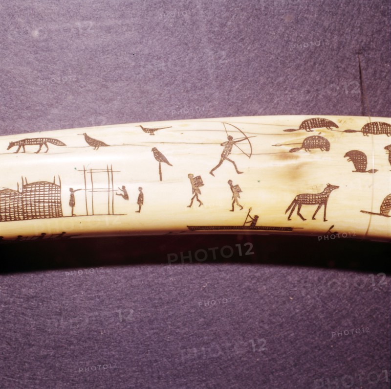 Eskimo Scene Detail of engraved walrus tusk, Western Eskimo. 19th Century.  Artist: Unknown.