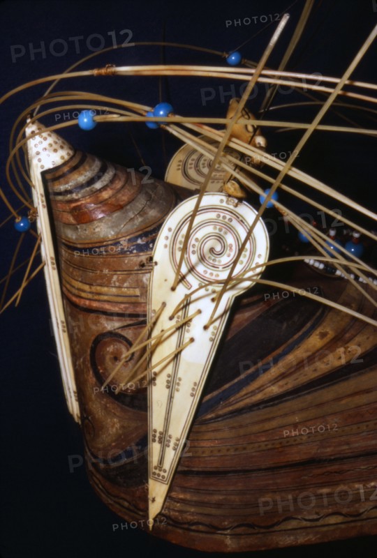 Inuit Wood hunting cap with ivory ornament collected during Cooks 3rd voyage, 1776-1780. Artist: Unknown.