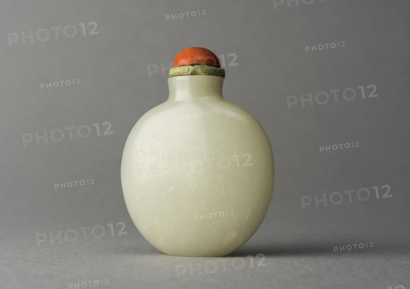 Jade snuff bottle with plum tree and characters on reverse, China, Qing dynasty, 1644-1911. Creator: Unknown.