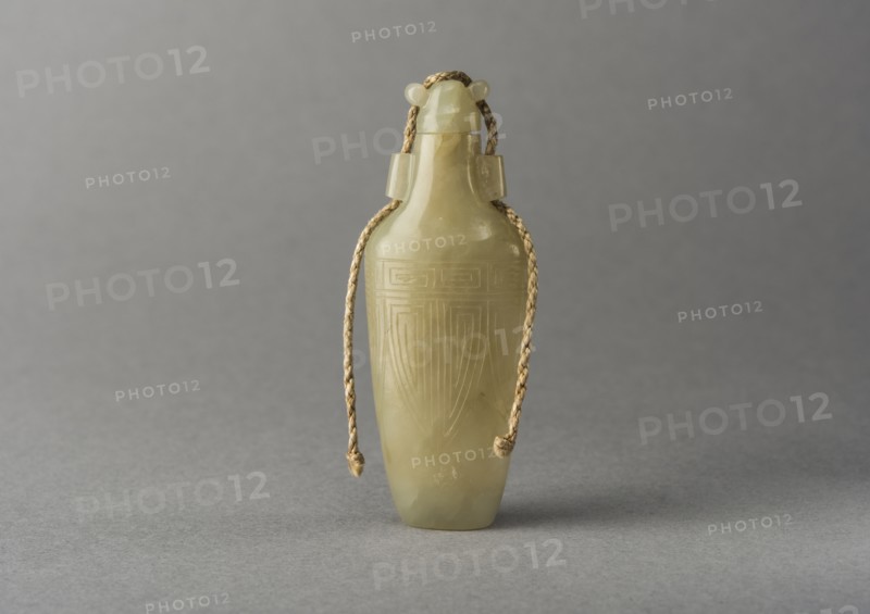 Pale Green jade snuff bottle with incised decoration, China, Qing dynasty, 1644-1911. Creator: Unknown.