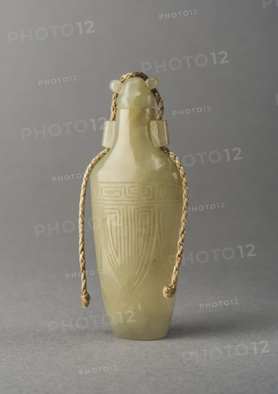 Pale Green jade snuff bottle with incised decoration, China, Qing dynasty, 1644-1911. Creator: Unknown.