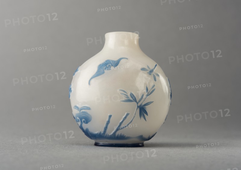 White glass snuff bottle with blue overlay, China, Qing dynasty, 1644-1911. Creator: Unknown.