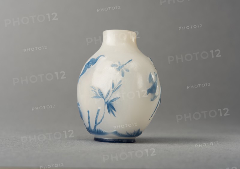 White glass snuff bottle with blue overlay, China, Qing dynasty, 1644-1911. Creator: Unknown.