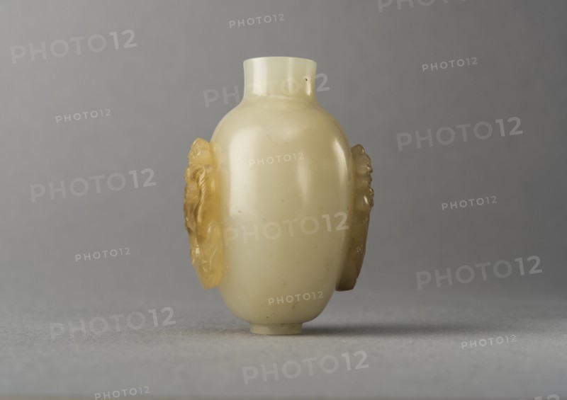 Jade snuff bottle with raised carving of animals, China, Qing dynasty, 1644-1911. Creator: Unknown.
