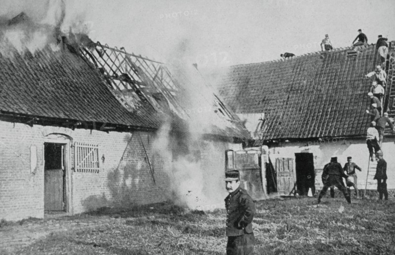 French soldiers fight a fire started by German incendiary bombs, Artois, World War I, 1915. Artist: Unknown