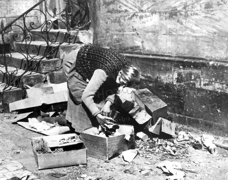 Woman scavenging for food, Bayreuth, Germany, April 1945. Artist: Unknown