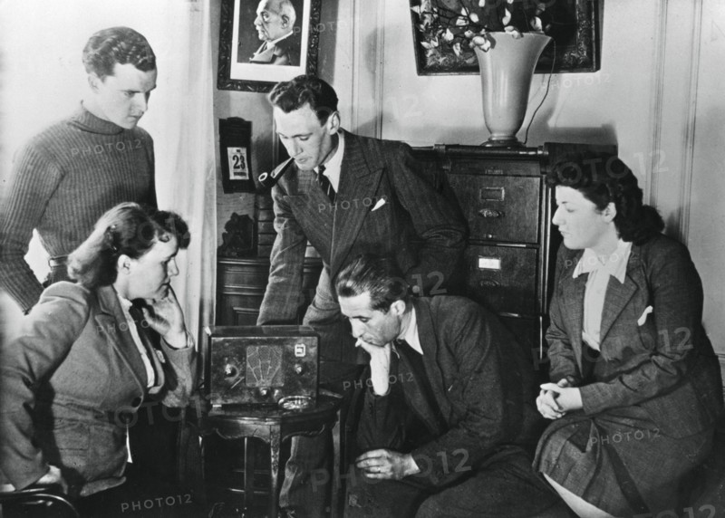 French citizens listening to a broadcast by Vichy deputy premier Admiral Darlan, 23 May, 1941. Artist: Unknown