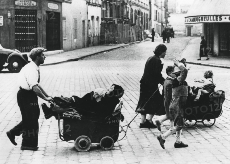 French refugees returning home after the fall of France to the Germans, France, July 1940. Artist: Unknown