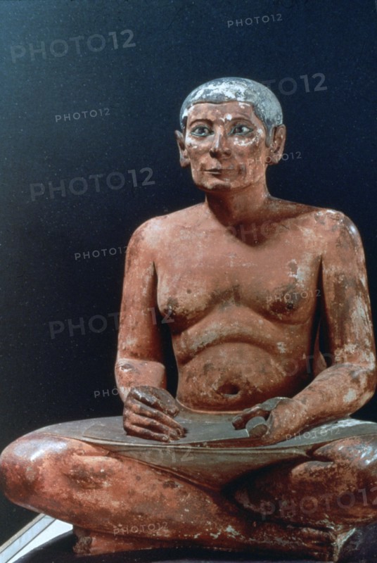 Ancient Egyptian figure of a seated scribe, 25th-24th century BC. Artist: Unknown