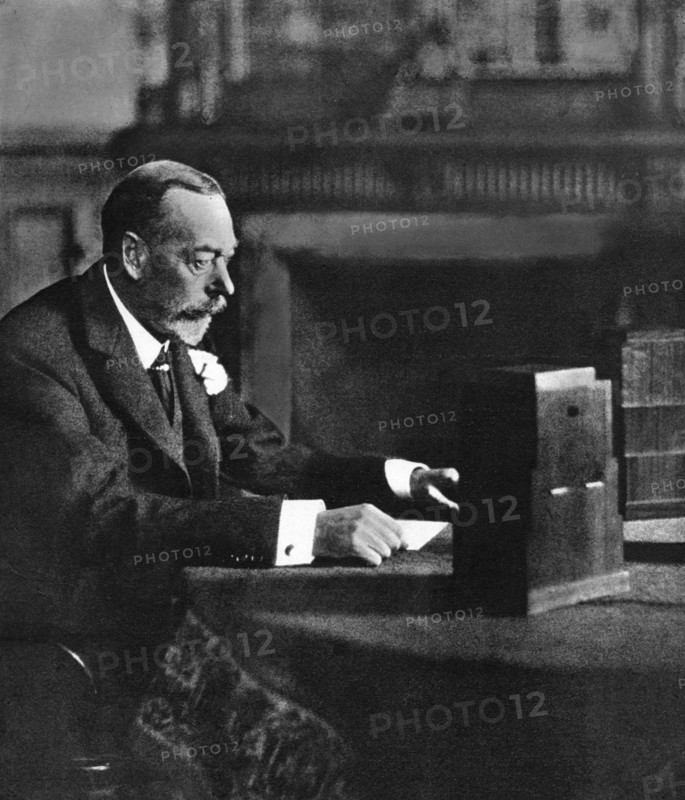 King George V broadcasting to the empire on Christmas Day, Sandringham, 1935. Artist: Unknown