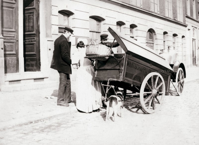 People and dogcart, Antwerp, 1898. Artist: James Batkin