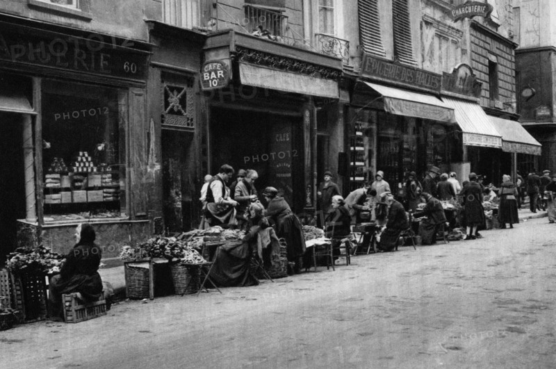 Vegetable sellers in the Central Market quarter, Paris, 1931.Artist: Ernest Flammarion