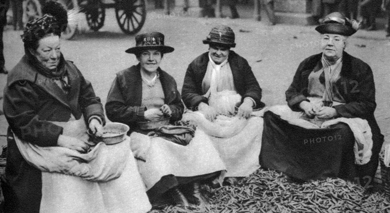 Pea shelling in Covent Garden, London, 1926-1927. Artist: Unknown