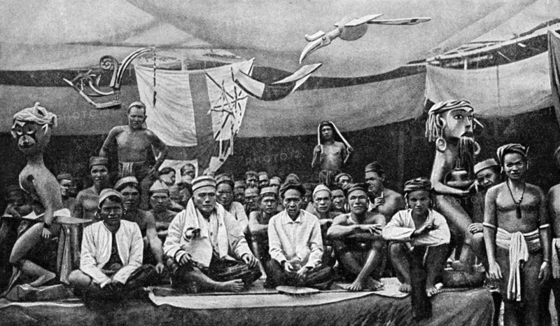 Traditional enemies assembled at a peace conference in Claudetown, Sarawak, c1899, (1922).Artist: Dr Charles Hose