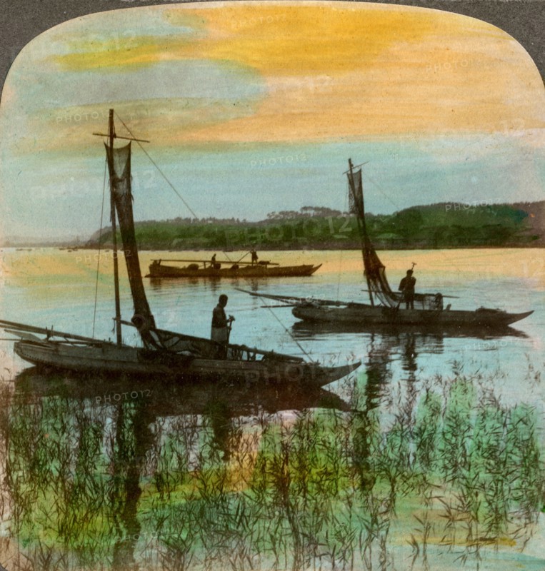 Fishing boats at sunset near Yokohama, Japan, 1904.Artist: Underwood & Underwood