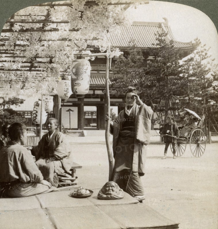 Drooping clusters of wisteria over a tea house porch, Kyoto, Japan, 1904. Artist: Underwood & Underwood
