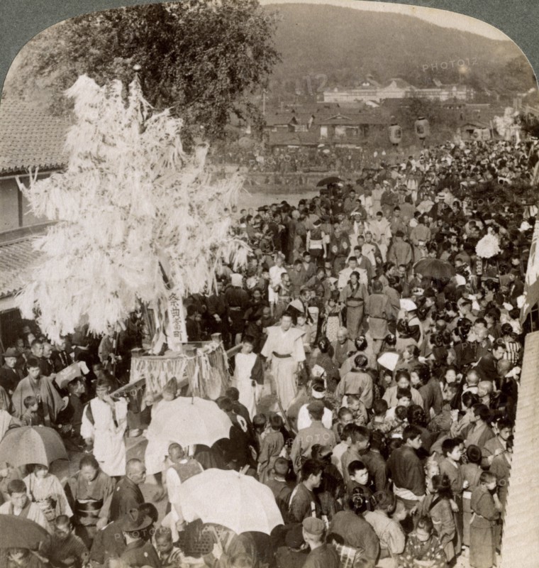 Shinto procession carrying sacred objects over a bridge to the Imperial Museum, Kyoto, Japan, 1904.Artist: Underwood & Underwood