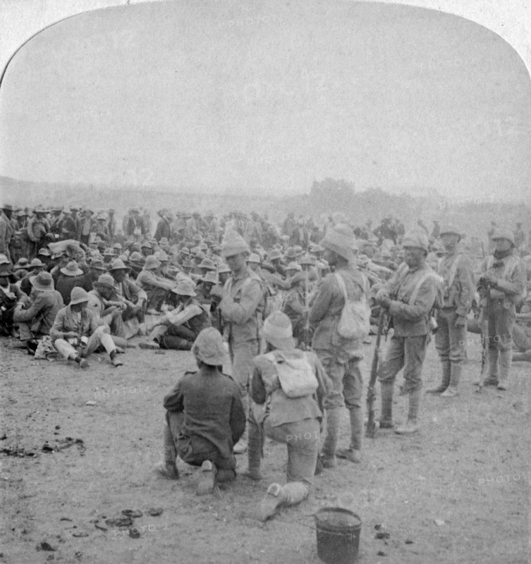 The overpowered Boer prisoners resting on the road from Paardeberg to Modder River, 1900. Artist: Underwood & Underwood