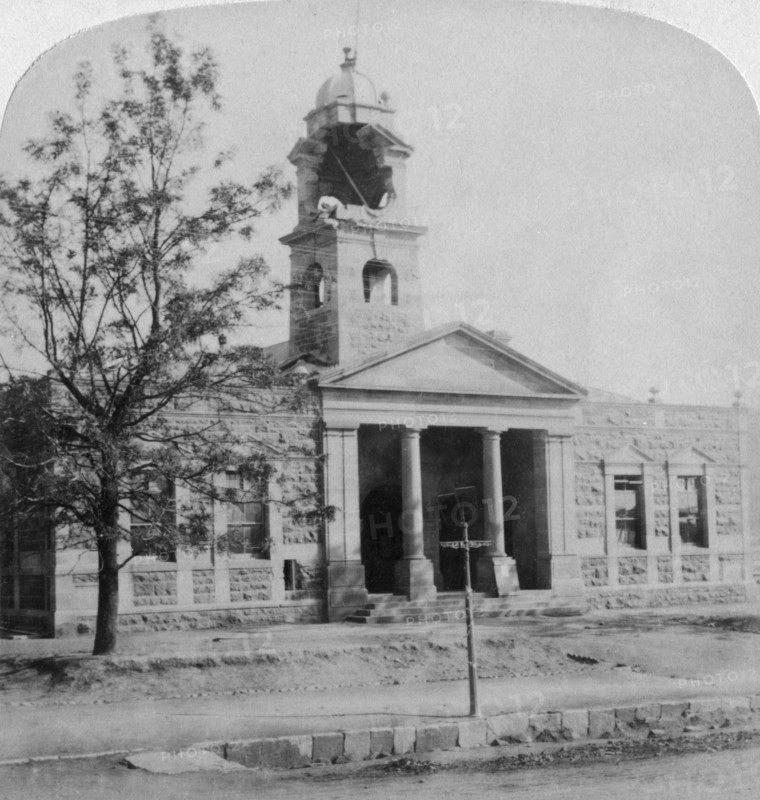 The Town Hall, struck by a Boer shell during the siege, Ladysmith, South Africa, 1901. Artist: Underwood & Underwood