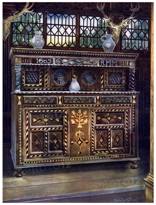 Carved and inlaid oak court cupboard, 1910.Artist: Edwin Foley