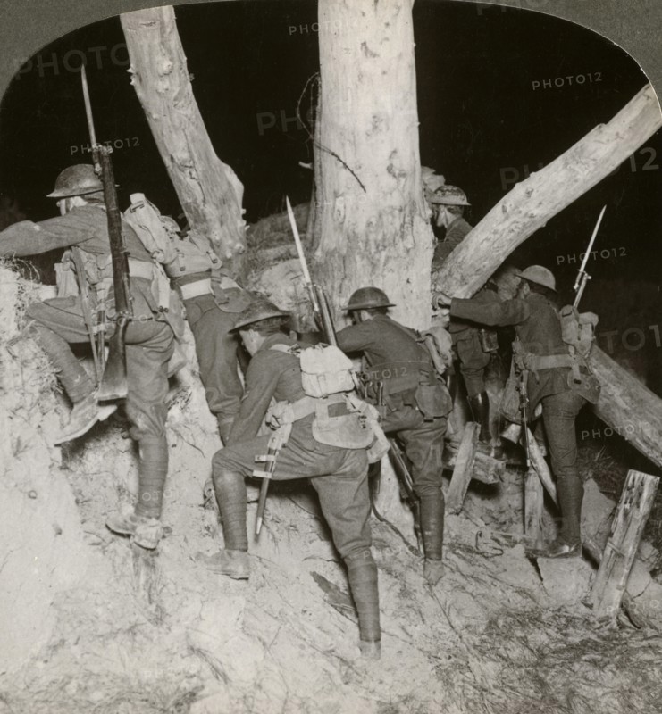 Soldiers leaving a trench for a night raid at Messines, Belgium, World War I, 1914-1918.Artist: Realistic Travels Publishers