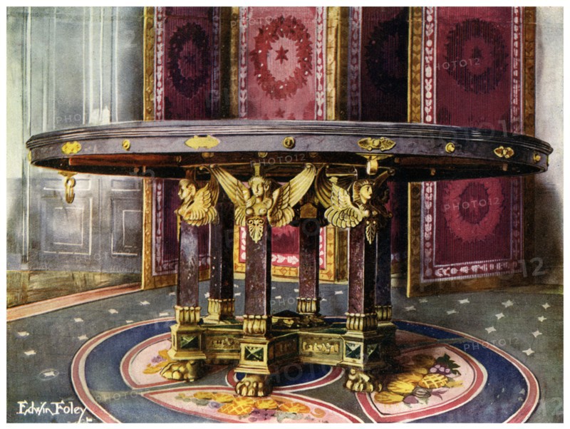 Circular table and folding screen, 1911-1912.Artist: Edwin Foley