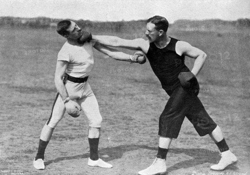 'The art of boxing, the right under the chin', Aldershot, Hampshire, 1896. Artist: Gregory & Co