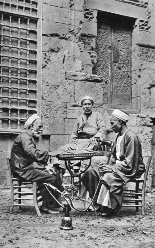 Men relaxing, Cairo, Egypt, c1922. Artist: Donald McLeish