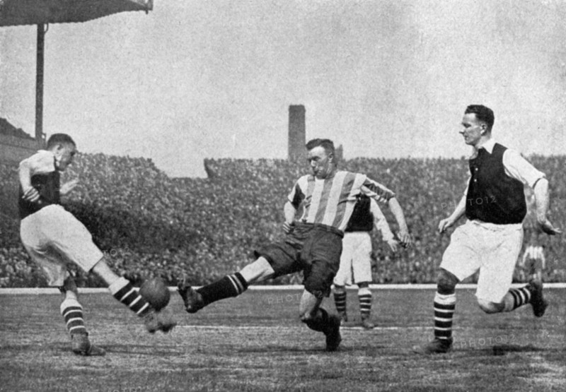 Action from an Arsenal v Sheffield United football match, c1927-1937.Artist: London News Agency