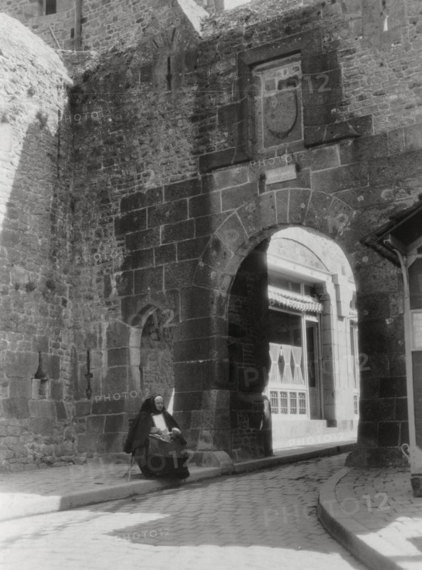Gateway and entrance to the only street of Mont St Michel, Normandy, France, 20th century. Artist: Unknown