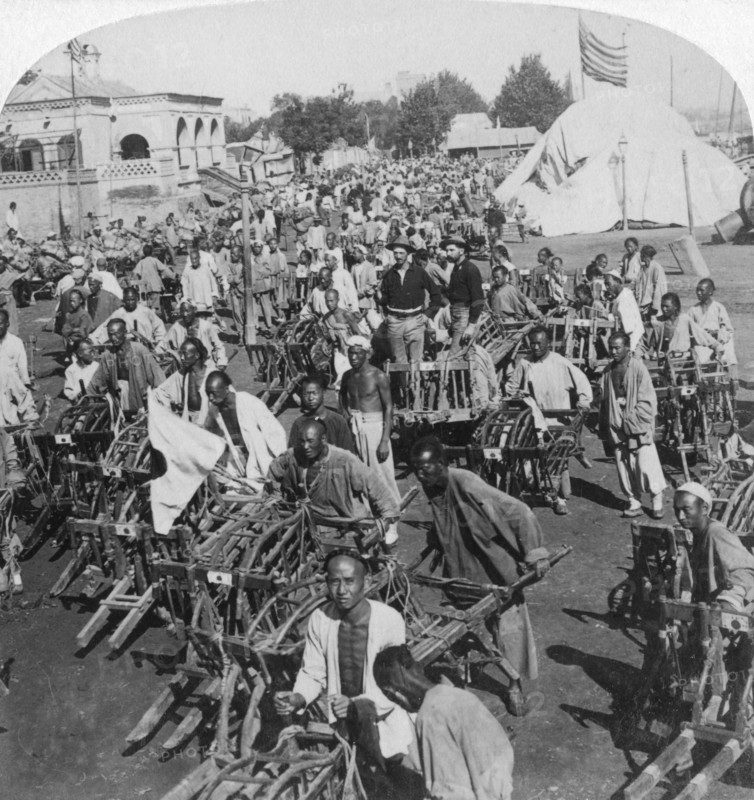 'Wheelbarrow transportation at the boat landing', Tientsin (Tianjin), China, 1901. Artist: Underwood & Underwood
