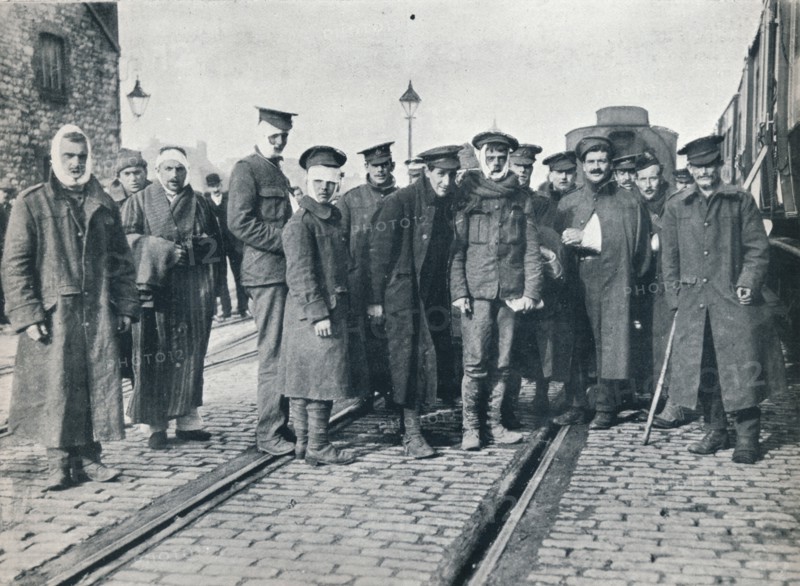 A batch of Neuve Chapelle wounded on a French railway station, 1915. Artist: Unknown