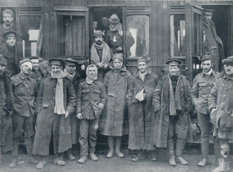 Wounded English troops on their way to a base hospital, c1914. Artist: Unknown