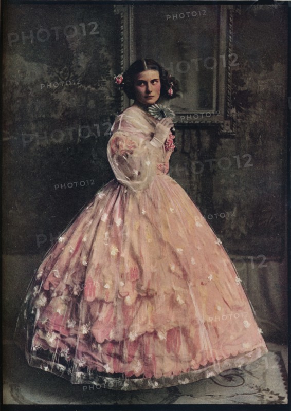 'A three-flounced ball-dress of pink silk, with overdress of white flowered gauze, 1850-60', c1913. Artist: Unknown.