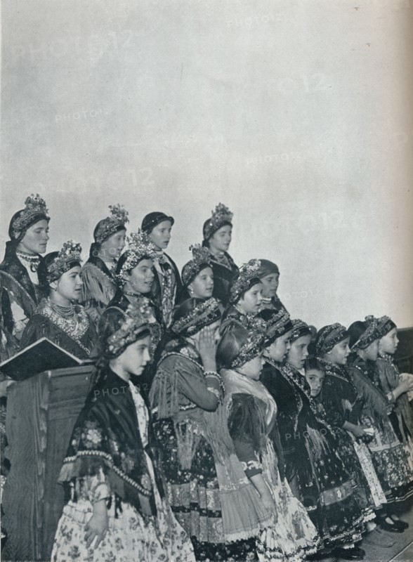 'Hungarian Peasant Girls Singing in Church', c1932. Artist: Rudolf Balogh.