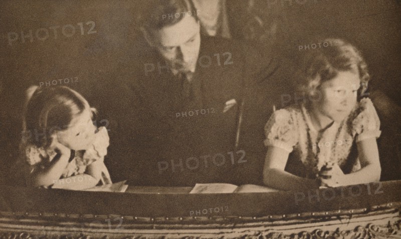 The Duke of York and Princesses Elizabeth and Margaret at the pantomime, 6 February 1935.  Artist: Unknown.