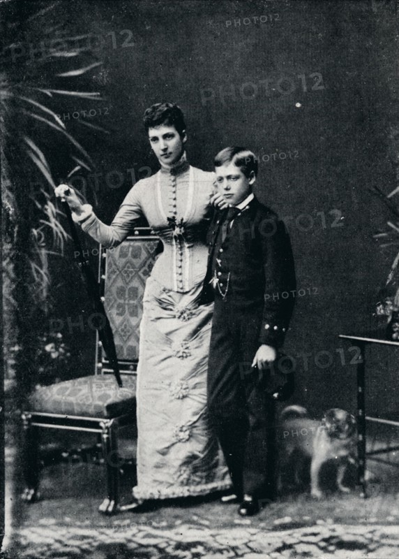 'Queen Alexandra and her second son, the future King George V, c1877 (1910). Creators: Sir Richard Holmes, W&D Downey.